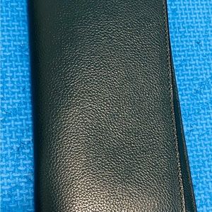 Dark turquoise Coach checkbook wallet. Used twice